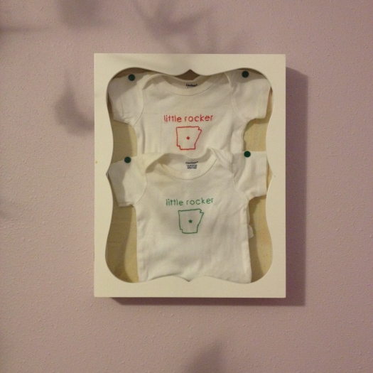 The girls wore these onesies in their newborn photos, so I made them into keepsake wall art now that they've grown.